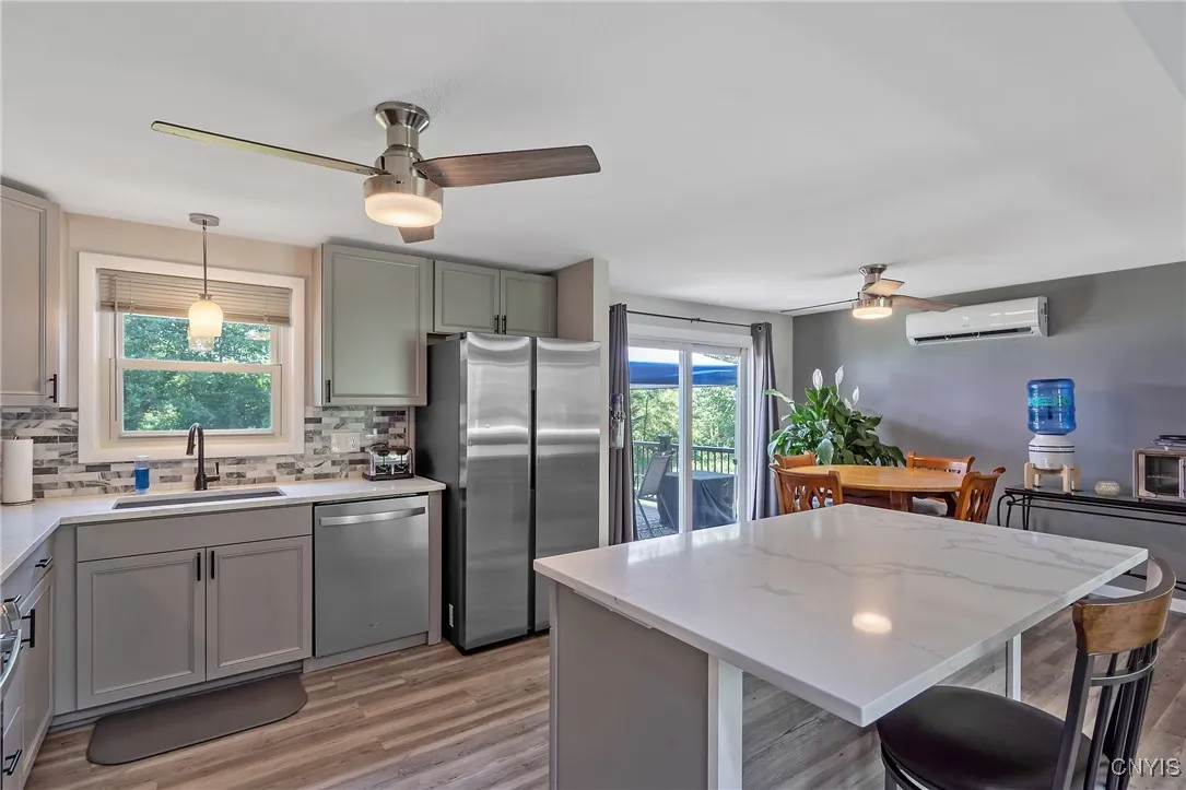 And the chef of the home is sure to be in awe of the vast eat-in kitchen. More updates to the lighting as well as a new refrigerator, gas oven/range, microwave and dishwasher means your wallet stays in your pocket when you move in.