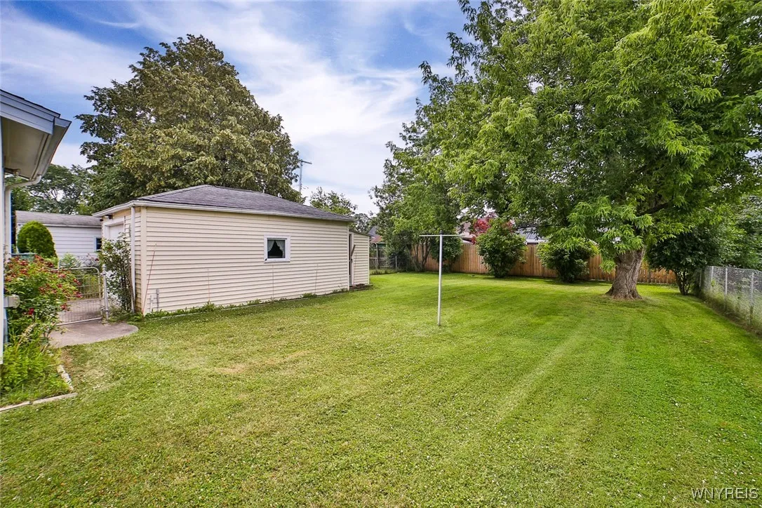 The lovely back yard is fully fenced.
