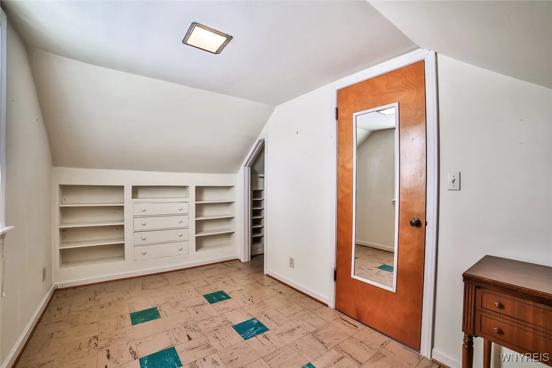 Bedroom on the second floor has the convenience of built in storage.