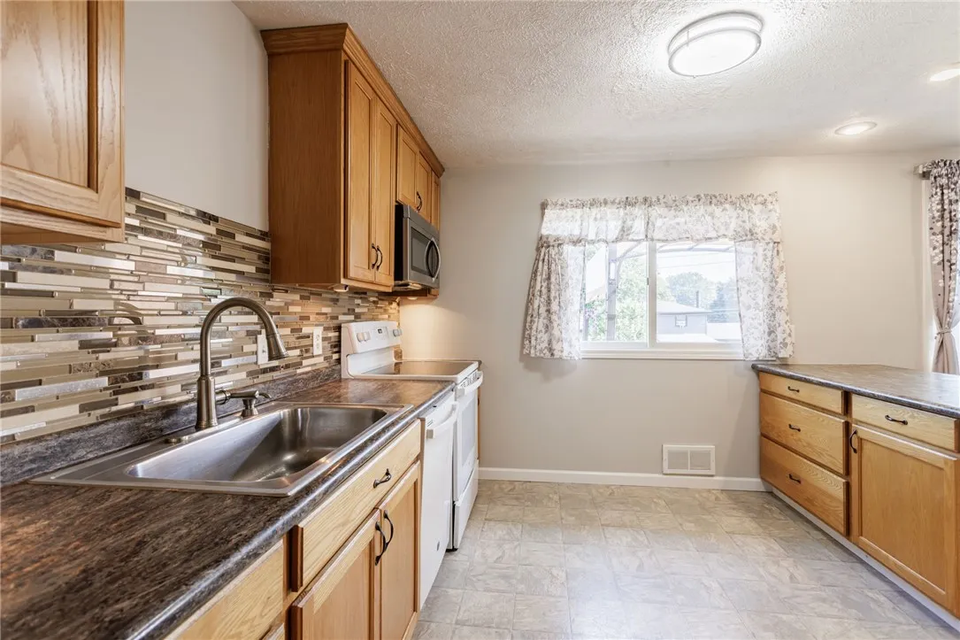 116 Churchill Drive North, Greece, New York 14616, Greece, New York 14616, 4 Bedrooms Bedrooms, 8 Rooms Rooms,1 BathroomBathrooms,Residential,For Sale,116 Churchill Drive North, Greece, New York 14616,R1622752