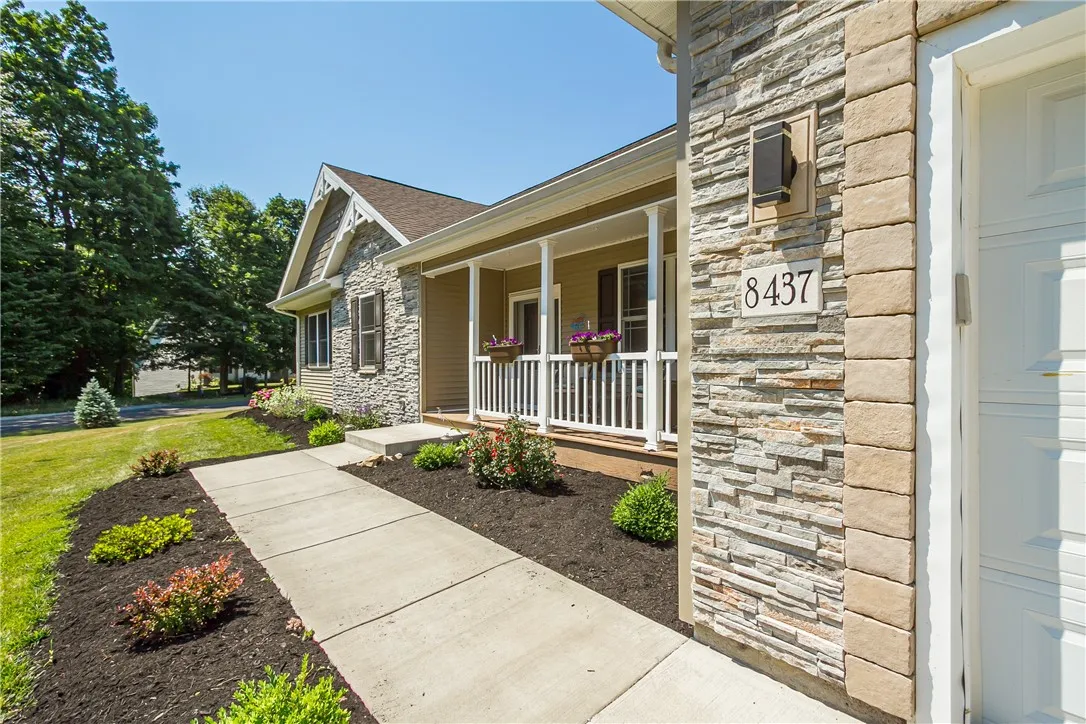WELCOMING COVERED FRONT WALKWAY