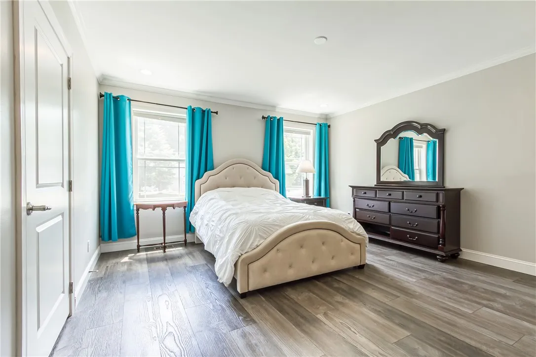 PRIVATE PRIMARY SUITE WITH A WALK IN CLOSET & A BEAUTIFUL BATH