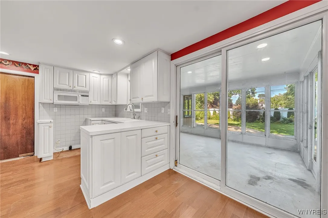 Sliding glass door off kitchen onto Patio
