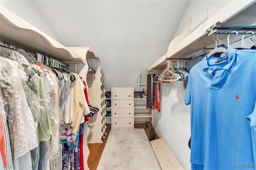 Primary Bedroom walk-in closet
