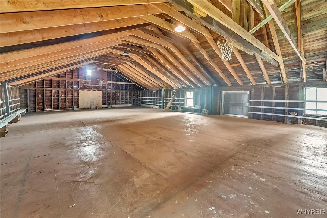 Second-story loft spans the entire length of the barn and features a full indoor basketball court—a unique and inspiring venue that has even hosted barn dances