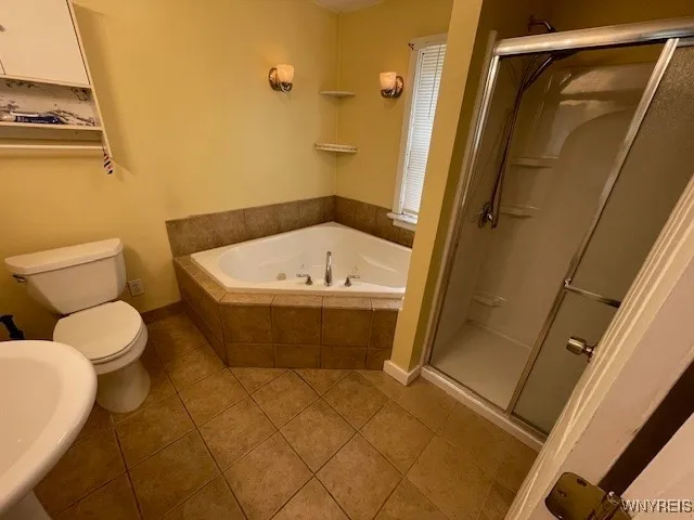 2nd. floor bath with jetted bathtub and walk-in shower.