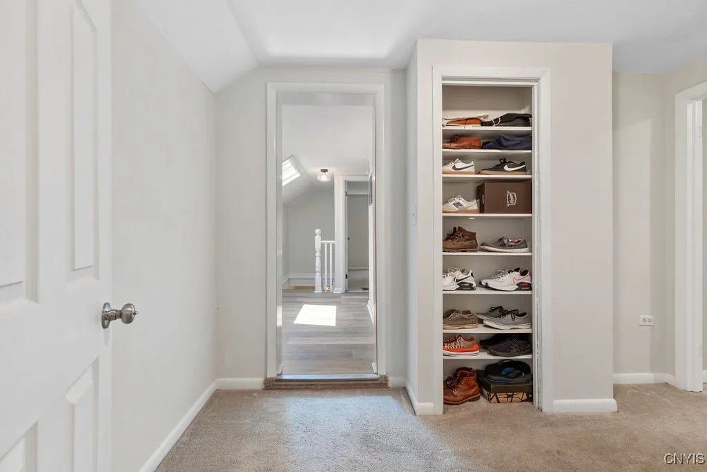Area off Primary Bedroom featuring dressing area & 1/2 Bathroom.