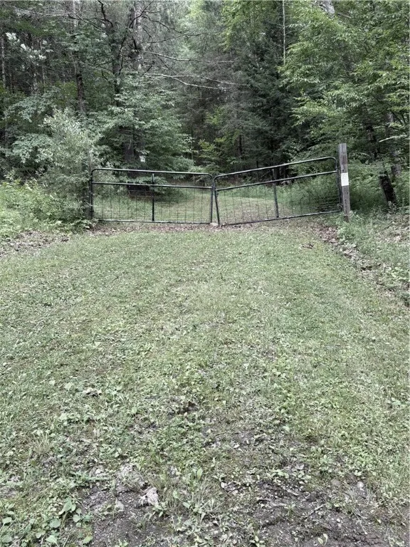 3rd driveway leads to a beautiful open area possible build site