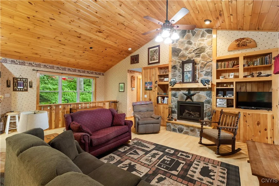 Gas Fireplace Surrounded by  Built in Cabinetry