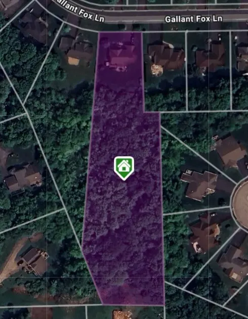 2.10 acre lot (goes deep into the wooded area)