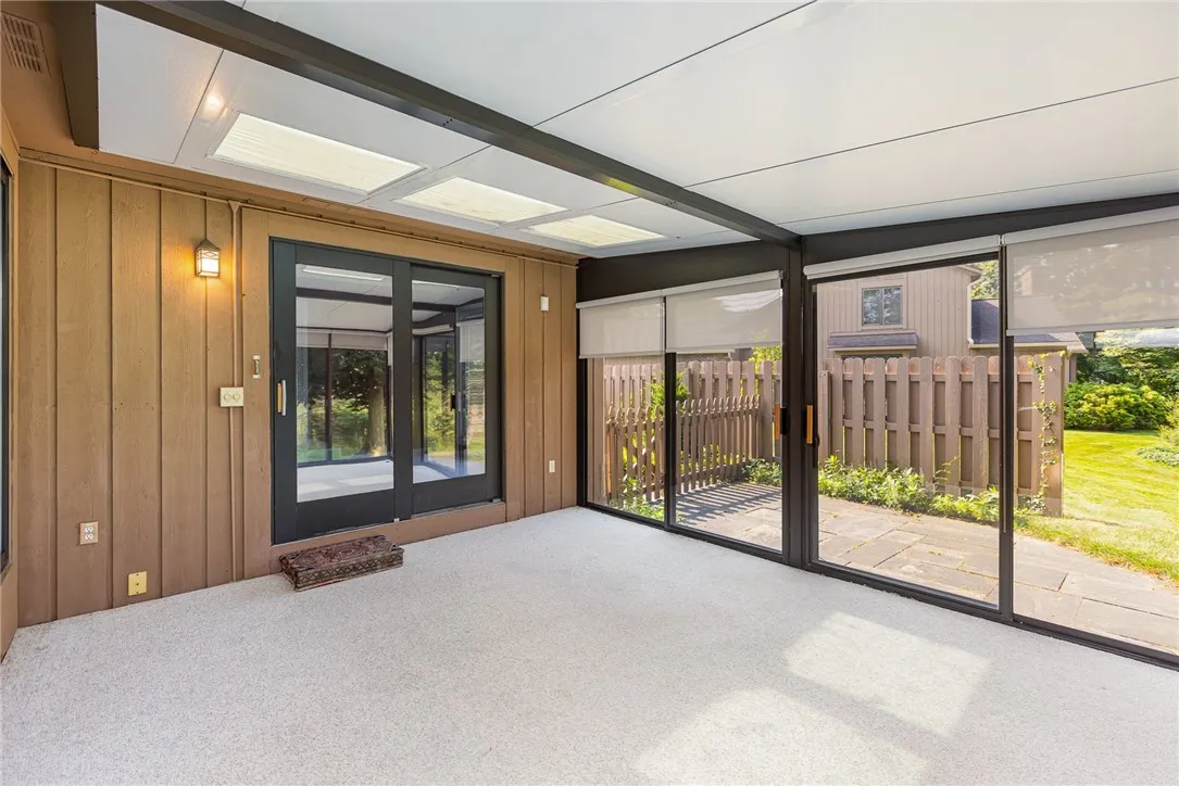 ENLOSED PORCH OFF THE DINING ROOM