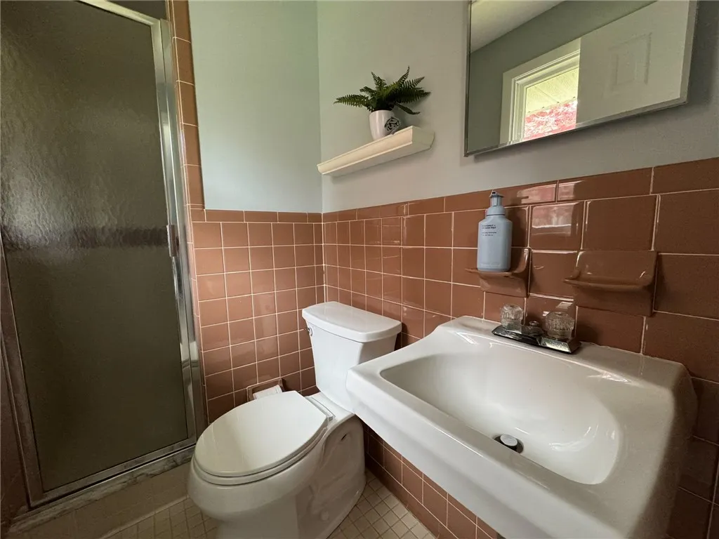 The primary bedroom bathroom is a private retreat.