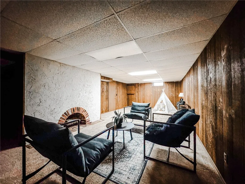 The basement is finished and is flexible space for family living or recreational activities. The basement