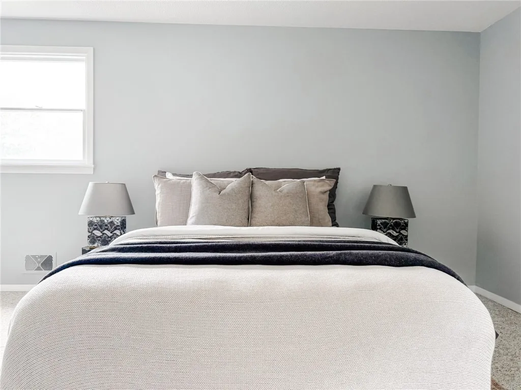 The primary bedroom is a spacious sanctuary.