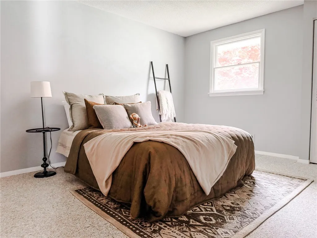 One of three spacious bedrooms with ample closet space.