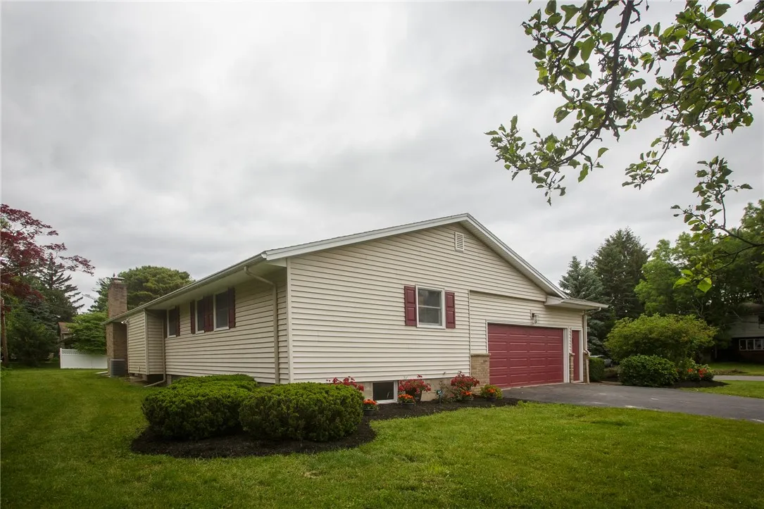 A two-car garage offers rom for vehicles and supply storage.