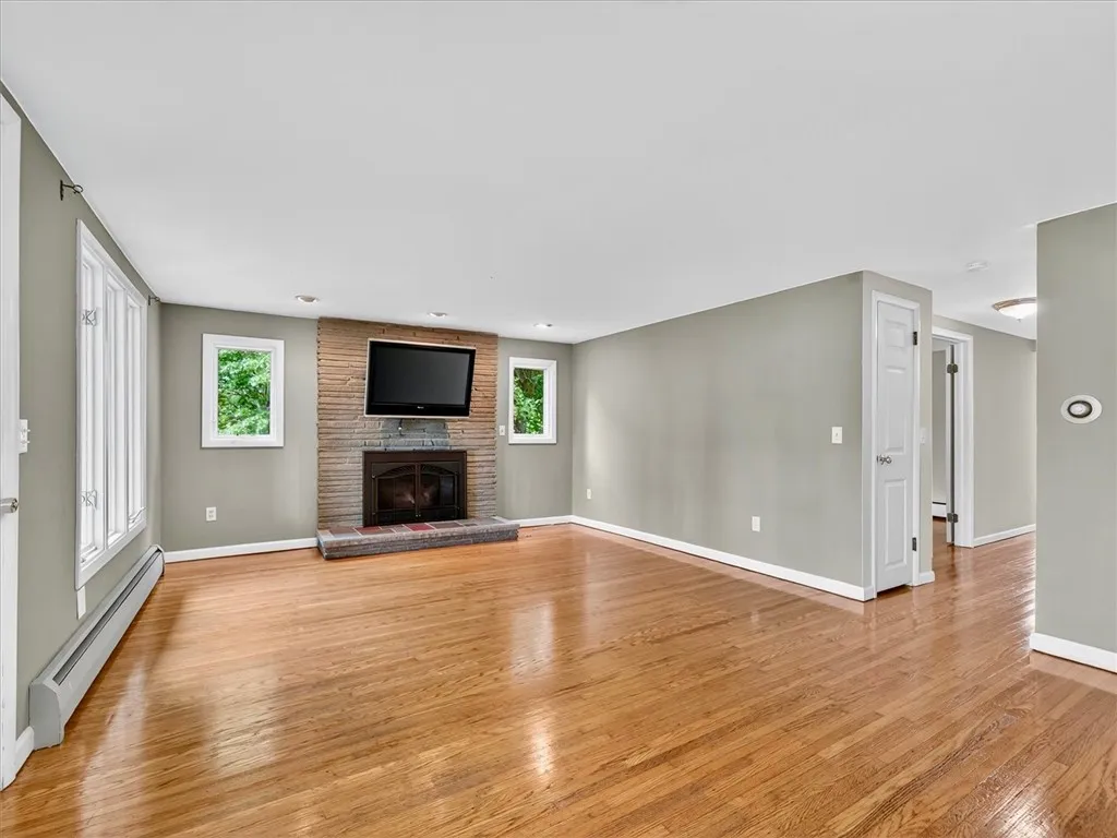 View from kitchen, gas fireplace