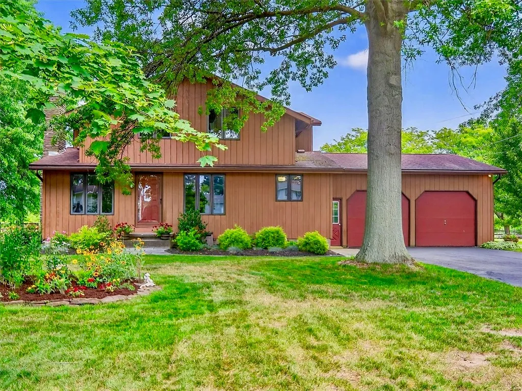 Great curb appeal with mature landscape