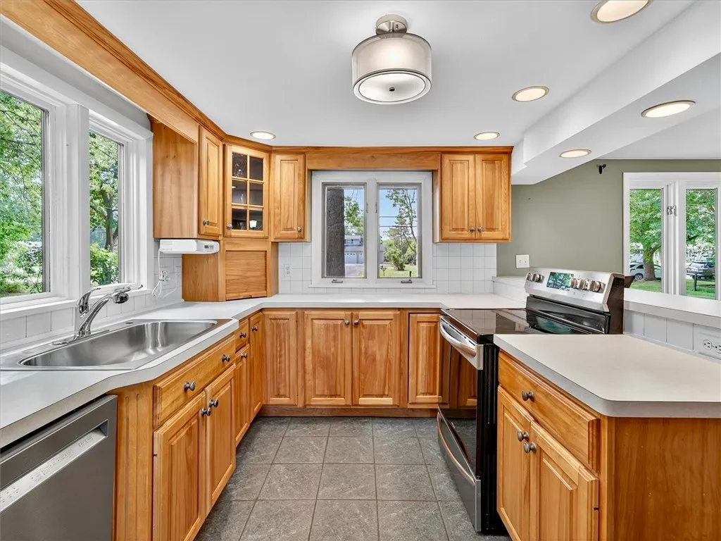 Spacious kitchen with ceramic tile flooring