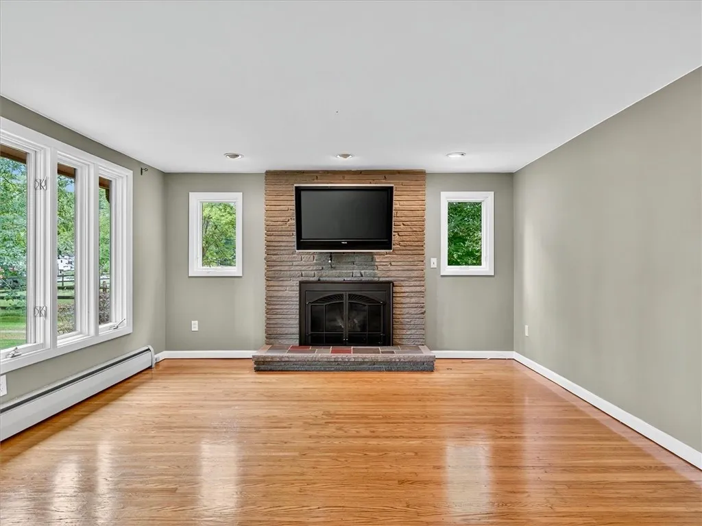 View from kitchen, gas fireplace