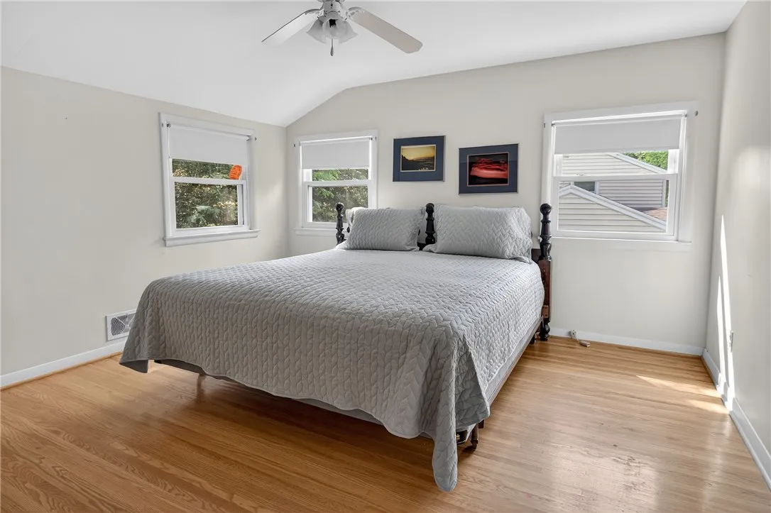 LARGEST BEDROOM W/ KING SIZED BED AND ROOM FOR NIGHTSTANDS AND DRESSERS.