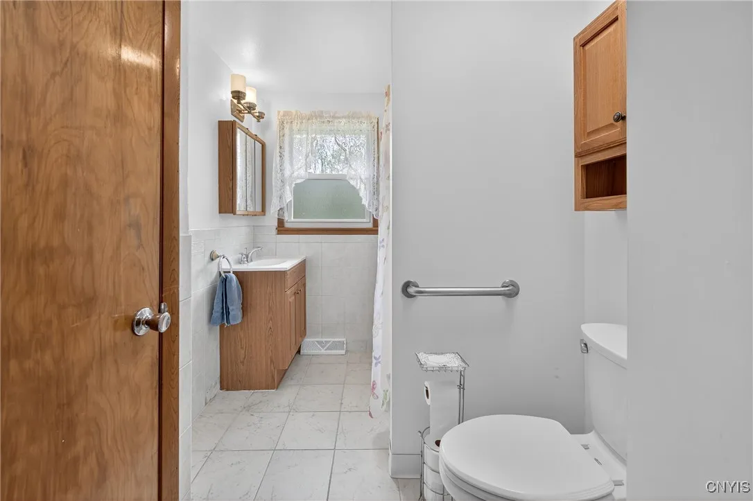 Renovated full bath with walk in shower