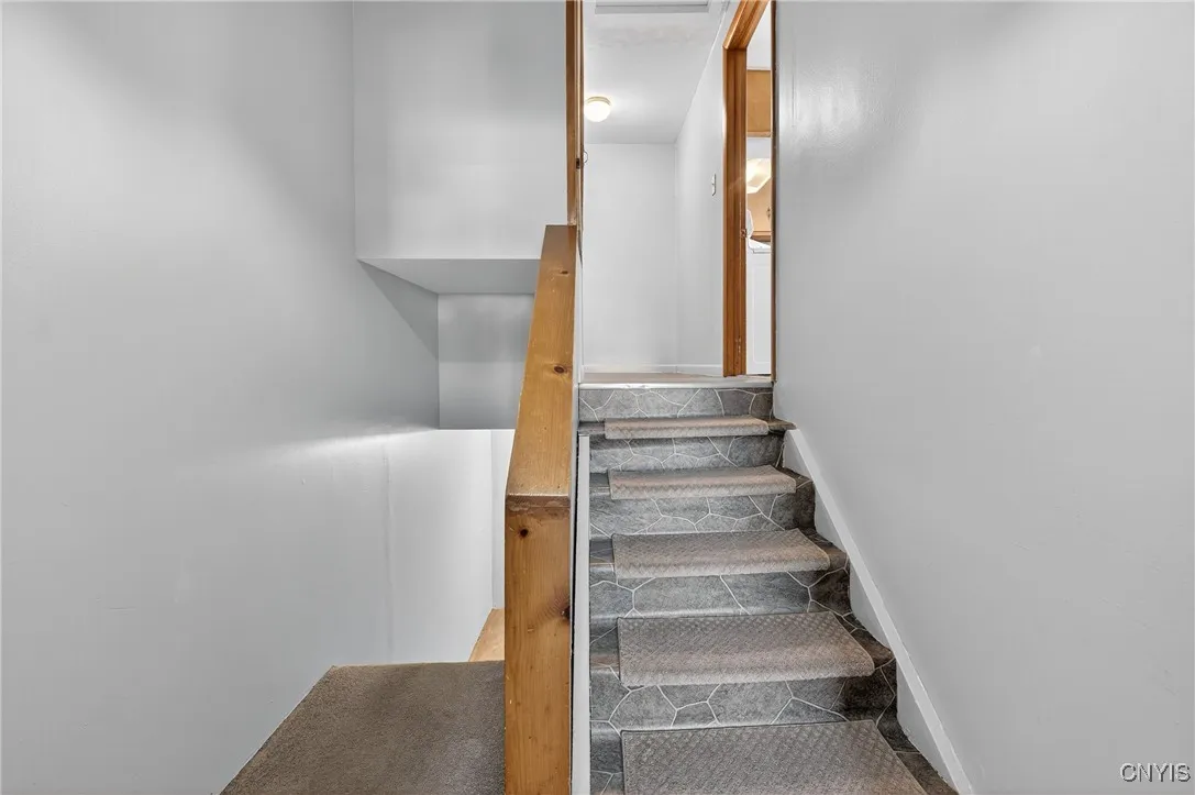 Entryway from Garage - upstairs to kitchen, downstairs to basement.