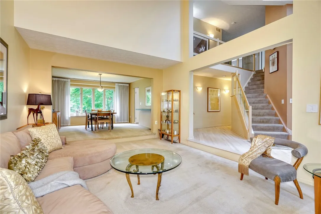 Foyer opens to Formal Living room with Vaulted Ceilings