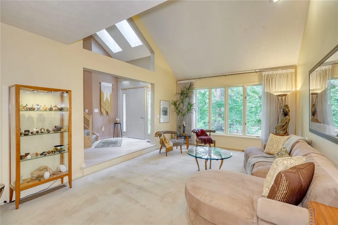 Foyer opens to Formal Living room with Vaulted Ceilings