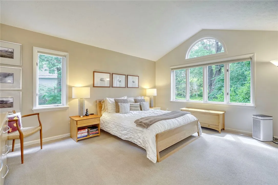 PRIMARY SUITE = WOW! Bright and Spacious with Vaulted ceilings and oversized windows!