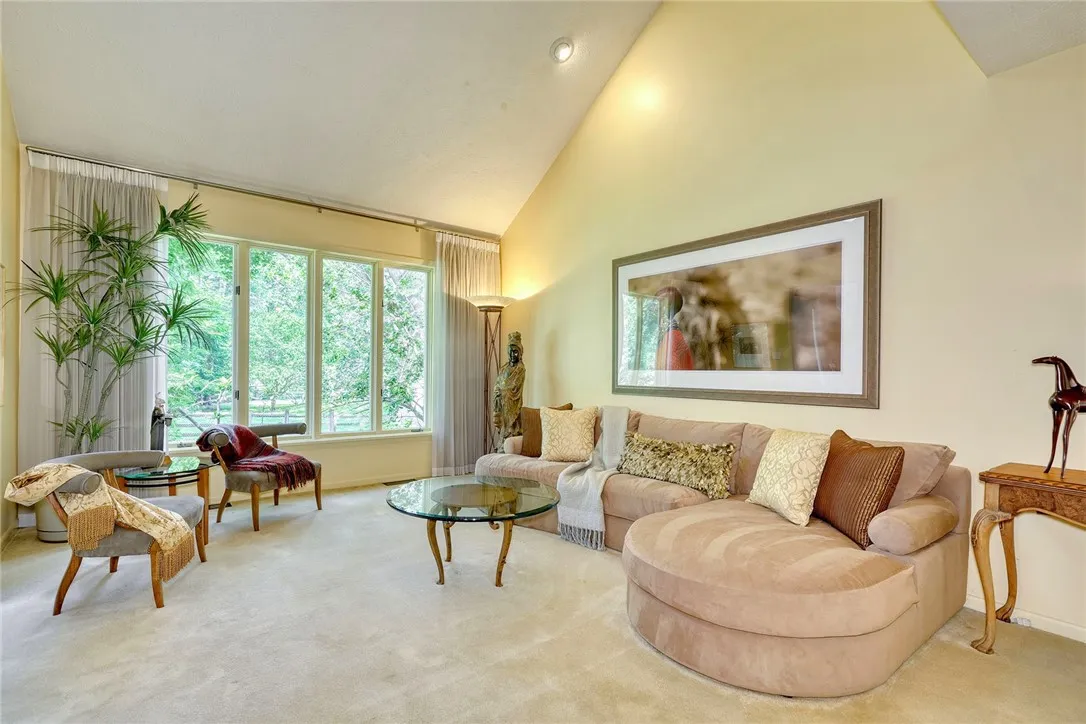Foyer opens to Formal Living room with Vaulted Ceilings