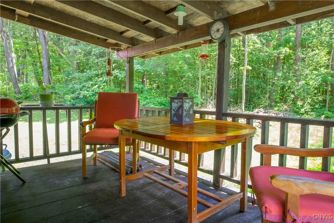 Porch #2 located on the South side of the home. and accessed from living room as well as from outdoors.
