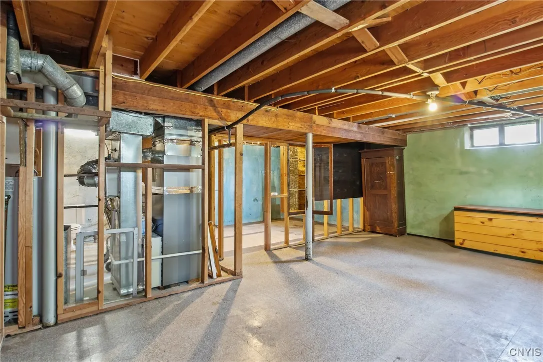 Large, dry basement with divided rooms and potential bathroom
