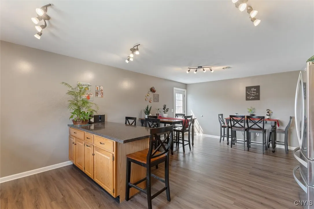 Multiple areas to sit in the eat in kitchen