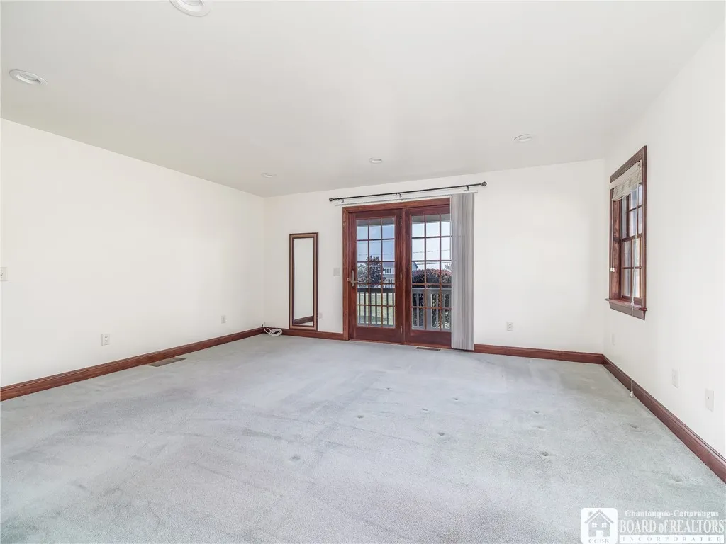 Primary Bedroom with access to a private porch