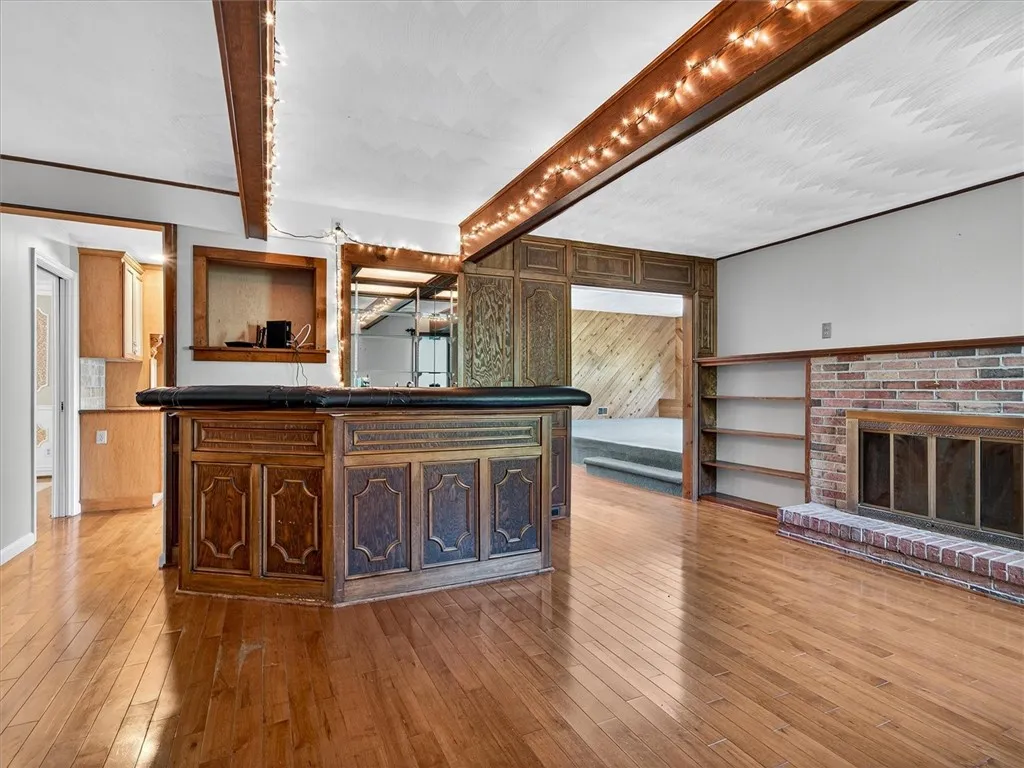 Bar/Rec Room With Fireplace Off Kitchen