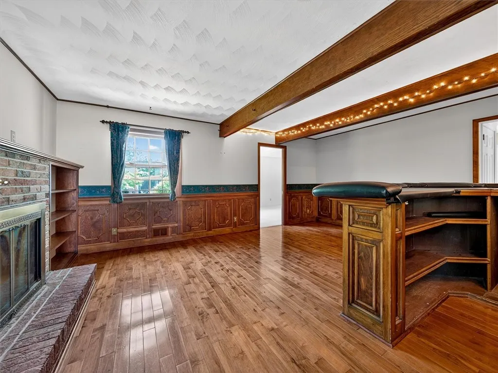 Bar/Rec Room With Fireplace Off Kitchen