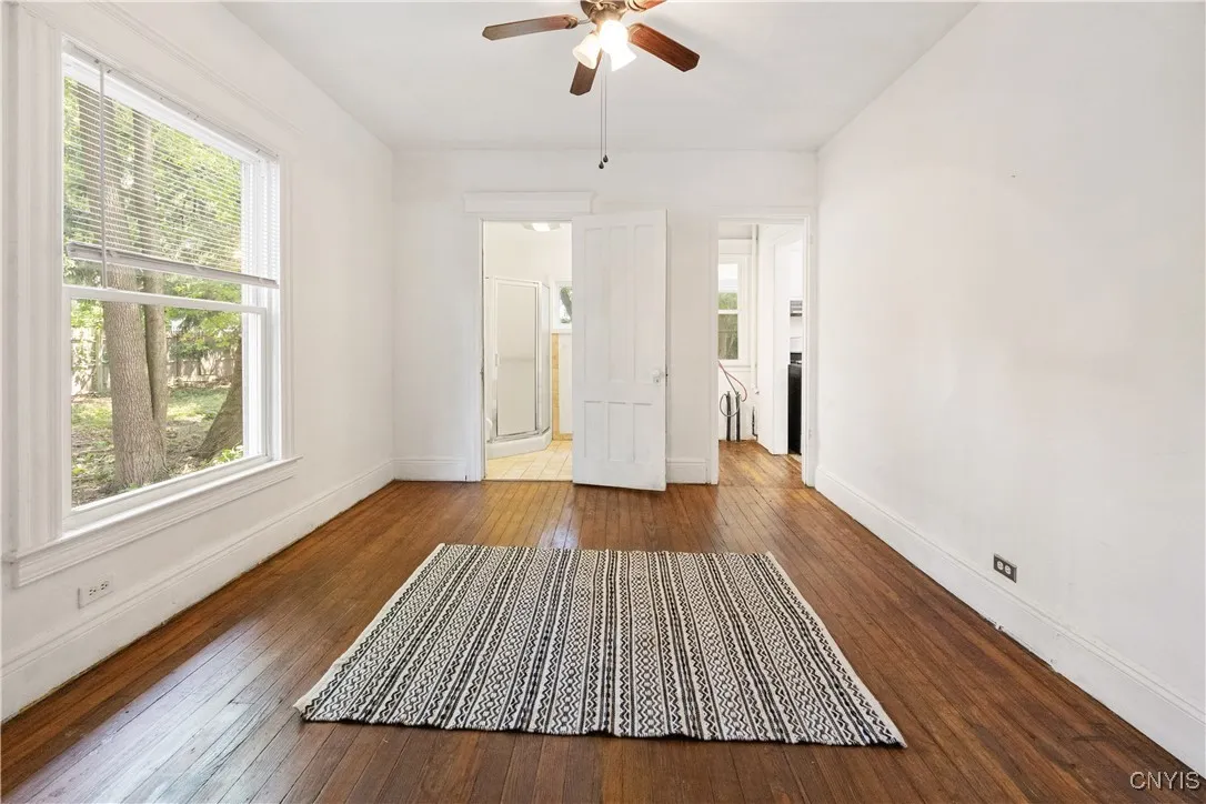 Spacious dining leads to butler\'s pantry, kitchen, and 1st floor full bath