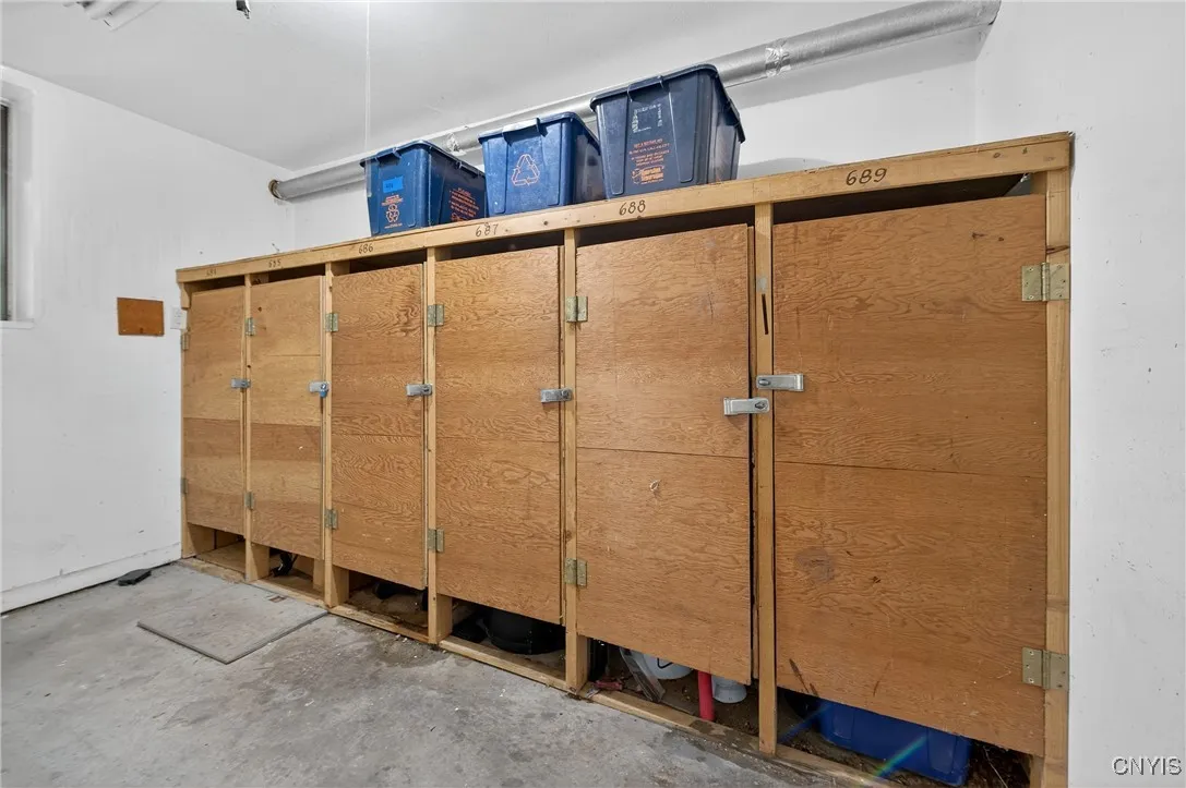 In the basement/ common area- garbage & recycling (labled 689)
