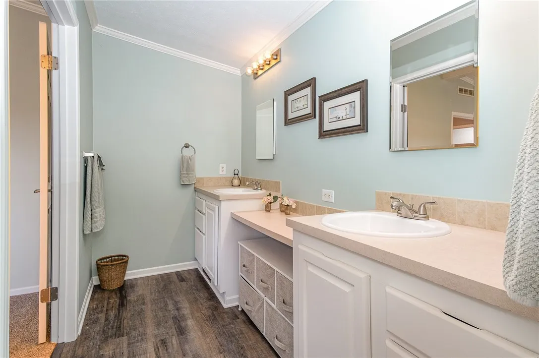 Primary Bath with two sinks and makeup vanity.