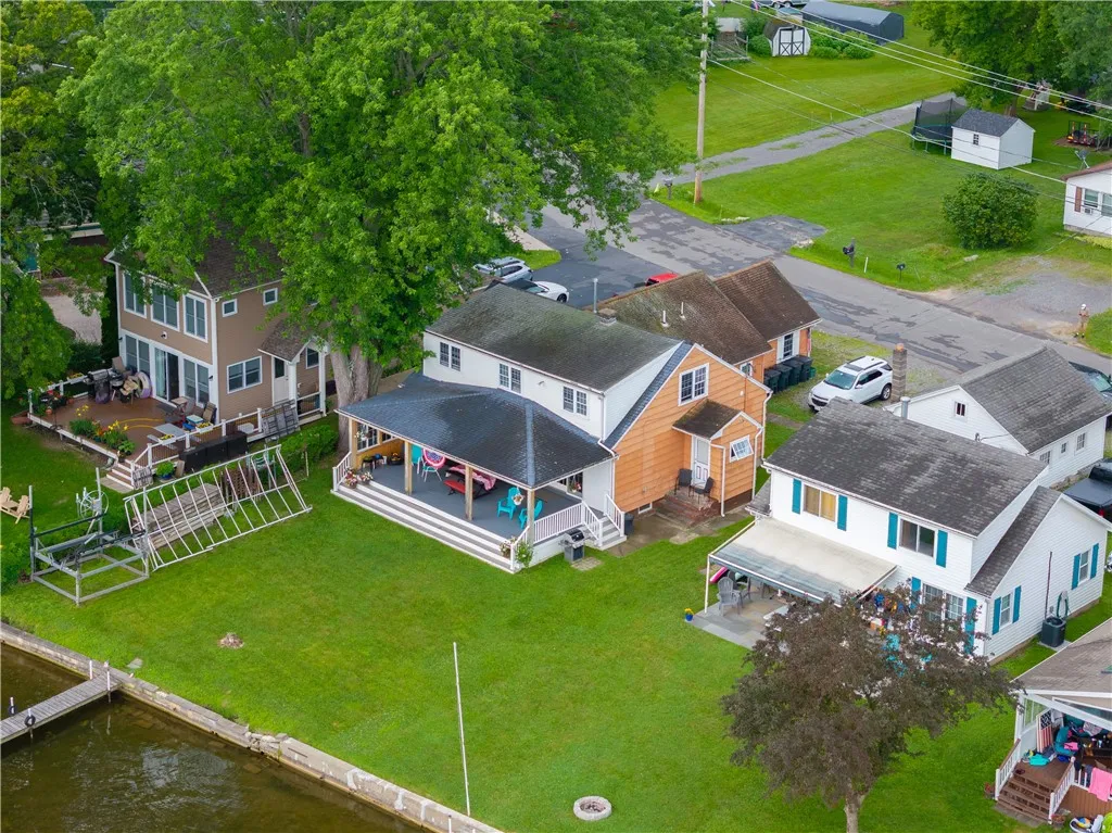 Mature treed lot , LEVEL greenspace for any gathering !