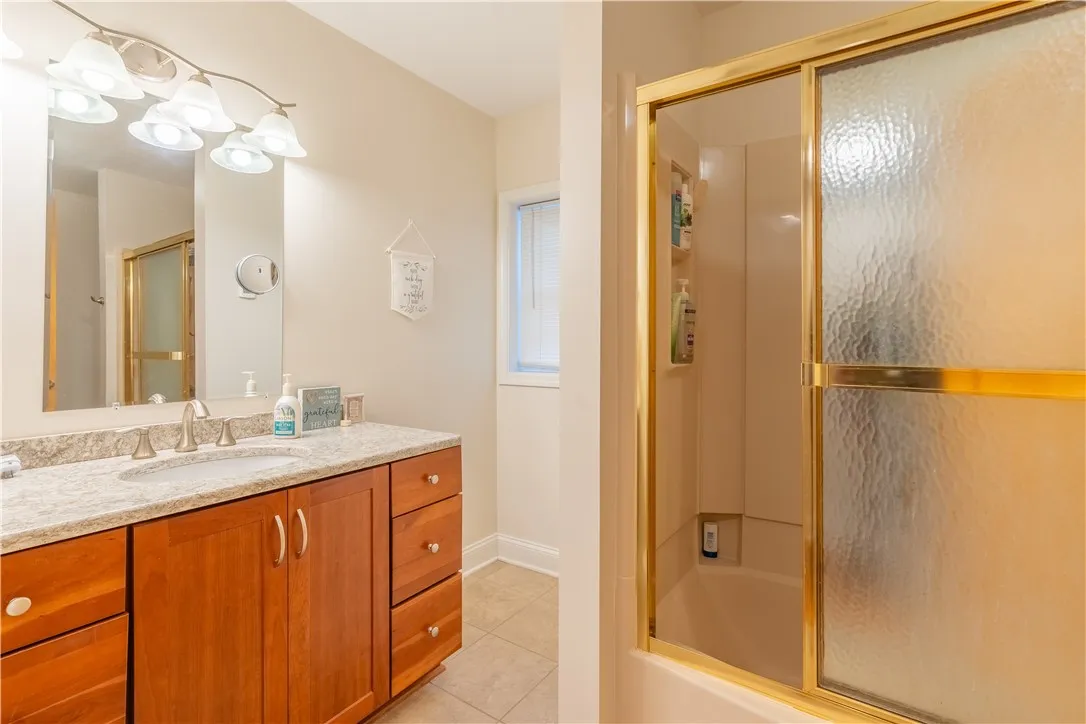 SECOND full bath also located on the 1st FLOOR down the hall with 3 bedrooms!
