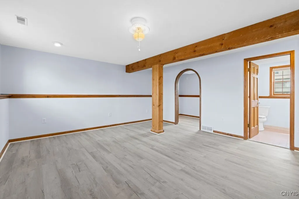 Great space in the lower level.  Office to the left and a full bath in room to right.