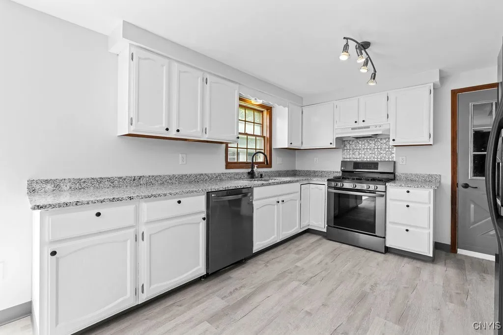 Bright Kitchen with brand new granite counters