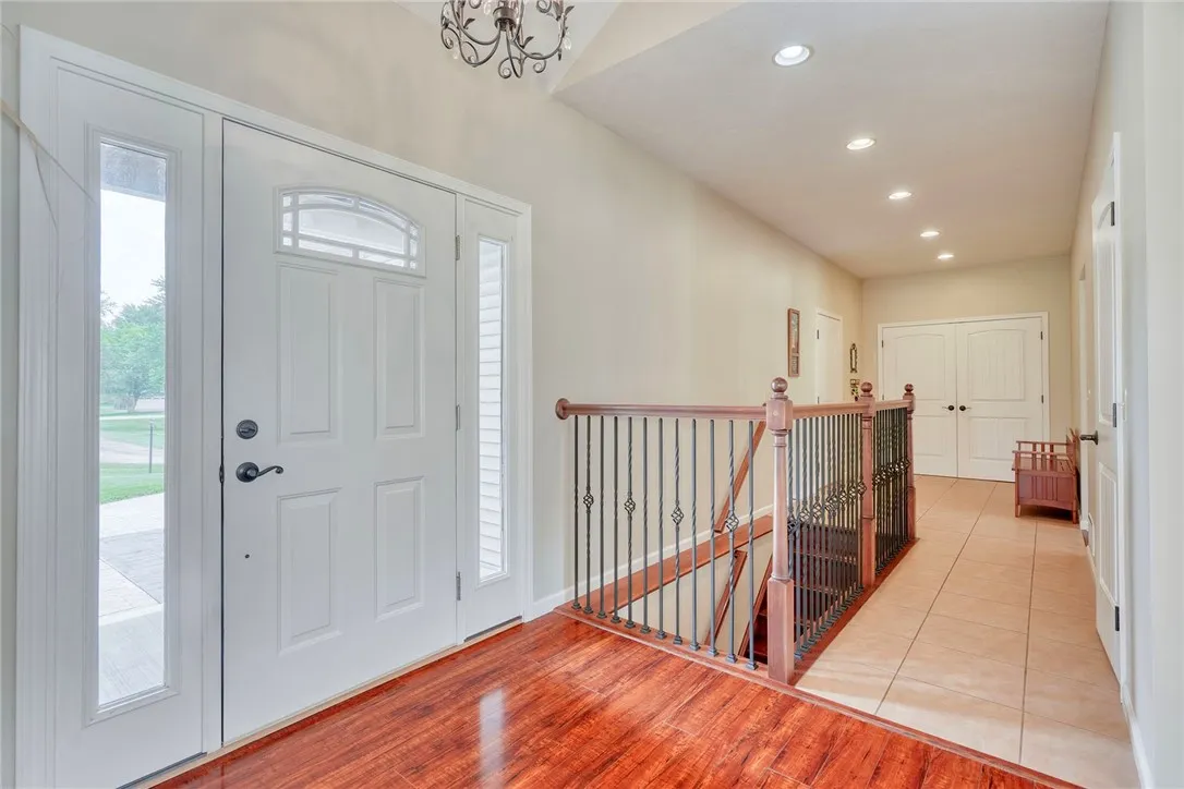 FRONT ENTRANCE *OPEN STAIRCASE TO FINISHED BASEMENT