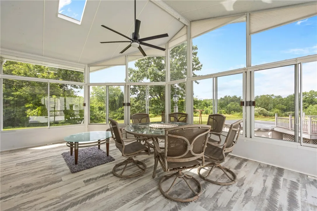 FLORIDA SUN ROOM WITH HUNTER DOUGLAS BLINDS