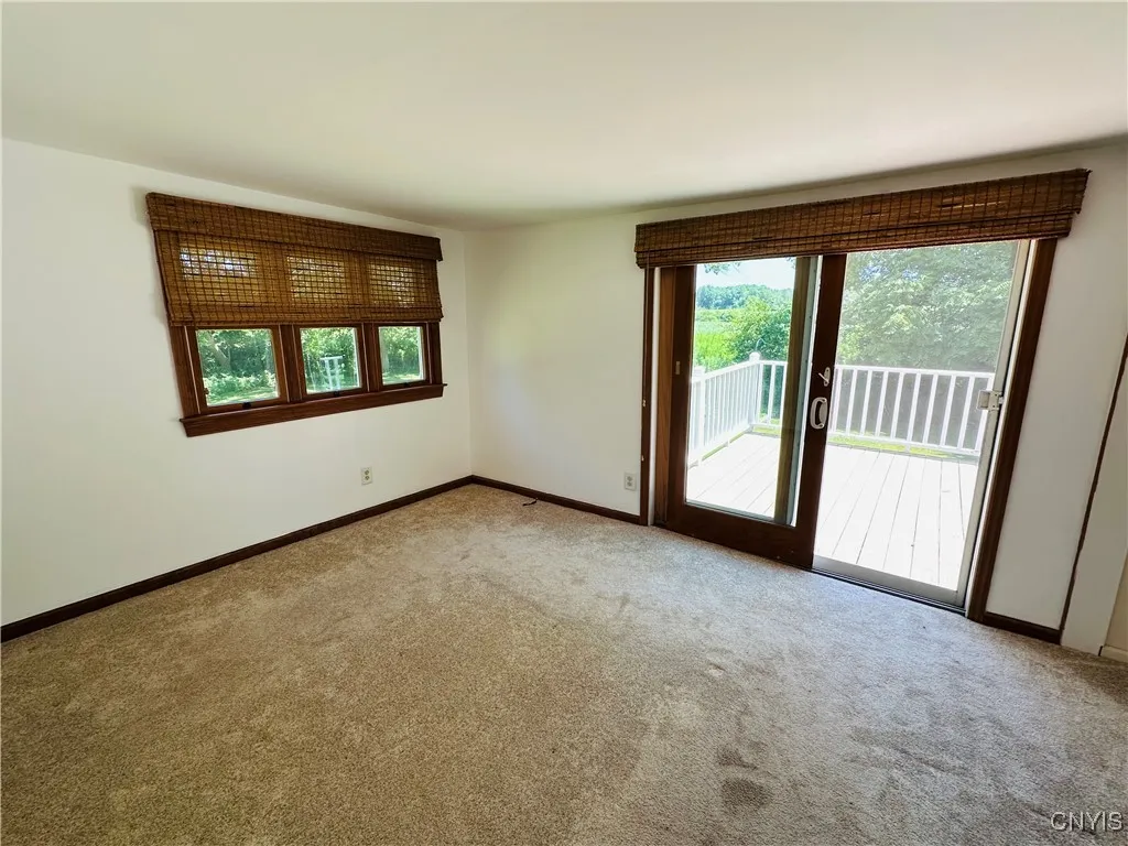 First floor bedroom with slider to the deck.