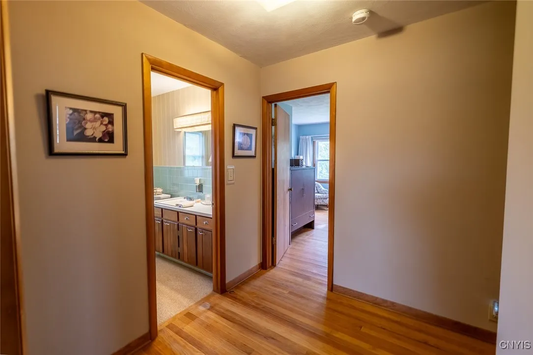 Hallway to Primary and Full Bath