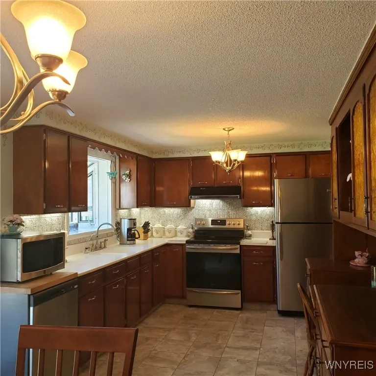 Eat in kitchen includes appliances