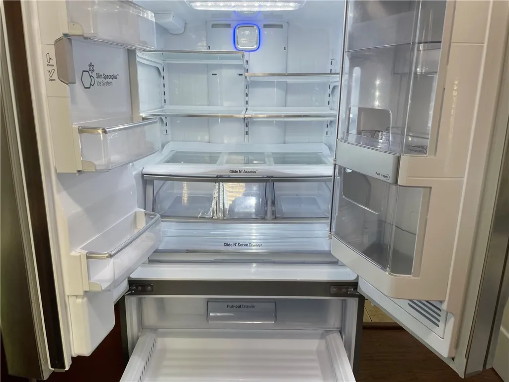 This refrigerator is practically showroom new!